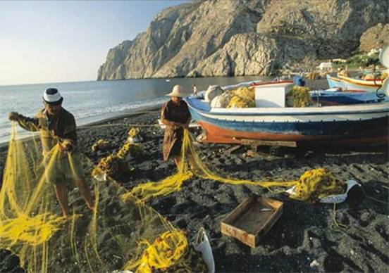 Photo: Fishers tending to their nets