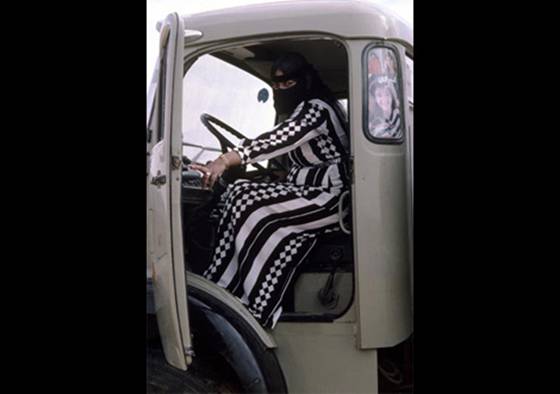 Photo: Veiled Bedouin woman truck driver